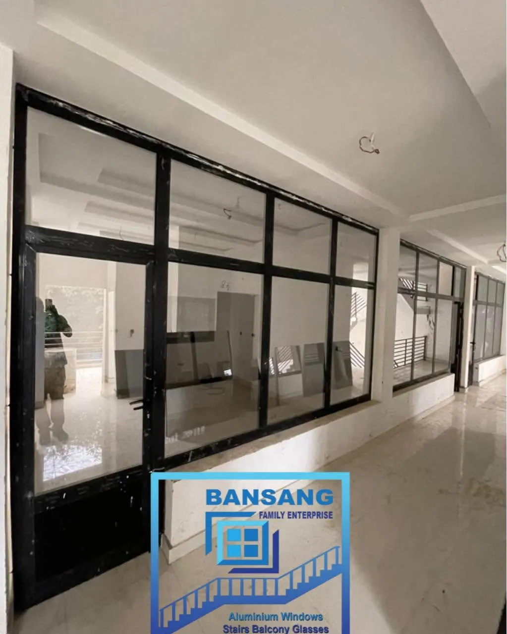 Commercial building with architectural glazing and stainless-steel terrace railings