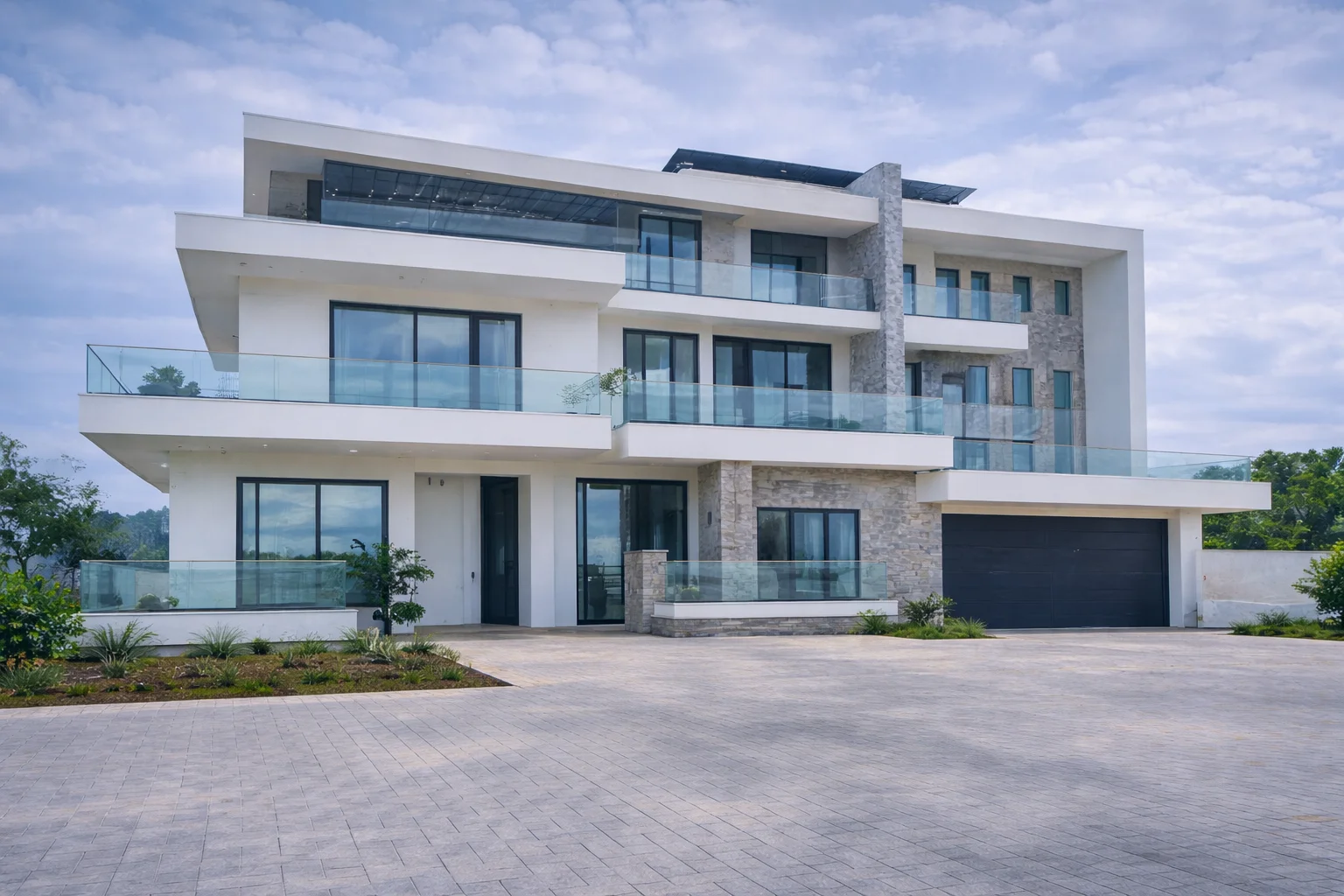 Modern home with glass balcony balustrades and aluminium windows